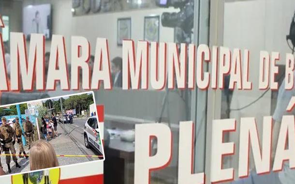 Câmara dos Vereadores de Blumenau e policiais ao redor da creche onde quatro crianças foram assassinadas