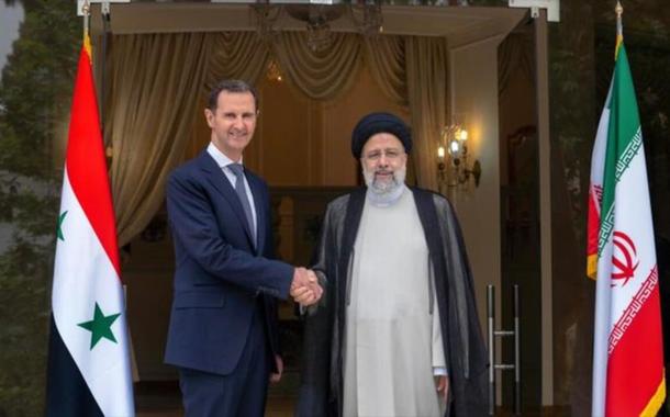 Assad e Raisí